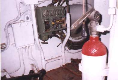 Behind driver's seat